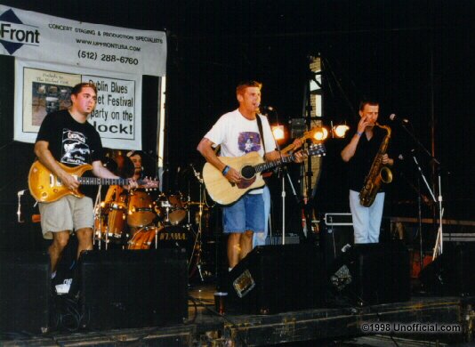 David Abeyta, George Devore and Chris Chipman of George Devore and The Roam and the Dublin Blues Fest on Fourth Street, Austin, Texas