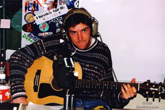 George Devore of George Devore and The Roam at a local radio station, Austin, Texas