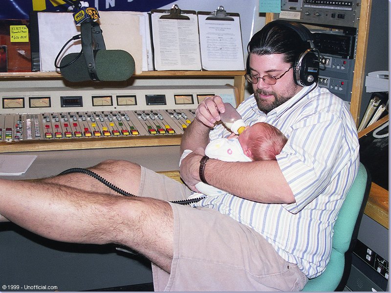 Jeff Gish with Garth and Debra's newborn son, Ethan at KLBJ-FM, Austin, Texas